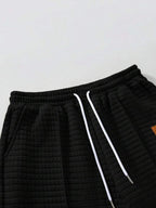 Conjunto Moletom Com Capuz Texturizado e Calça Com Cordão